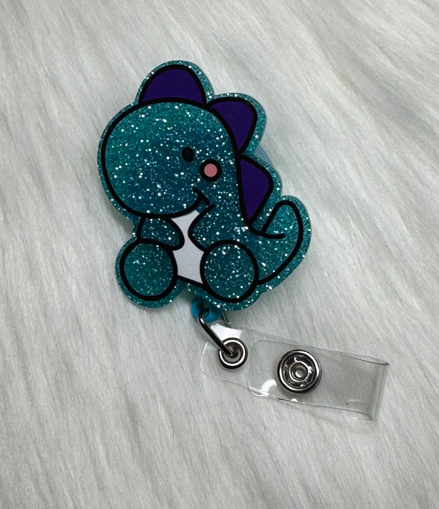 glitter dinosaur badge reel! 🦖