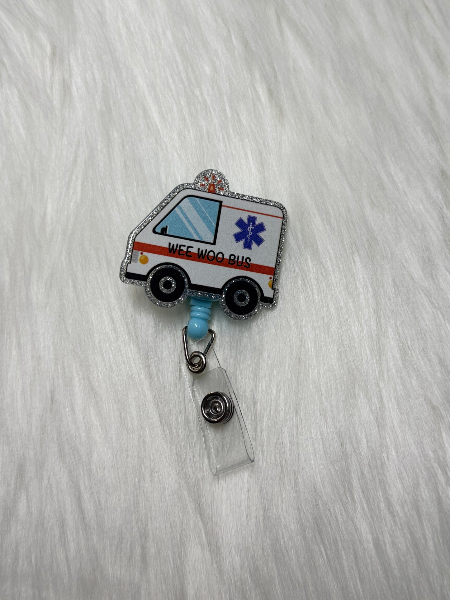 🚑 “Wee Woo Bus” Ambulance Badge Reel
